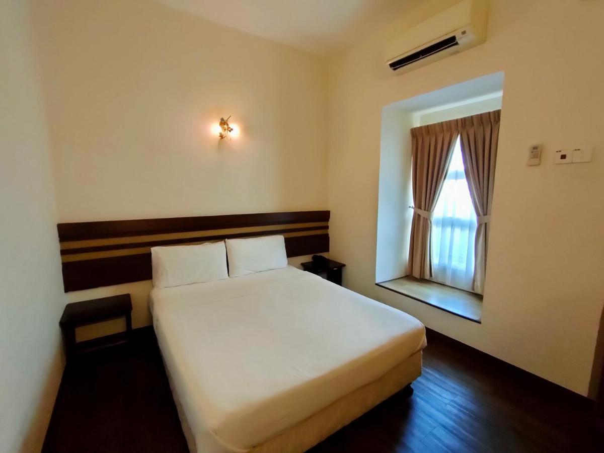Cozzy Motel Malacca Екстериор снимка